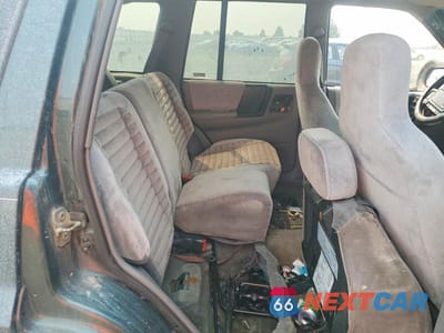 Zdjęcie 10 z 12 samochodu: 1995 JEEP GRAND CHEROKEE LAREDO VIN:1J4GZ58S4SC649397 - miniatura