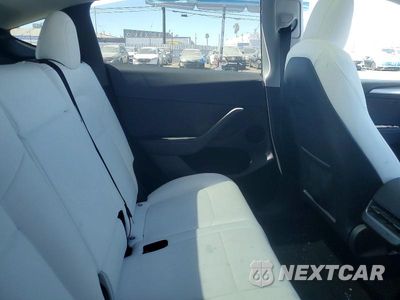 Zdjęcie 10 z 12 samochodu: 2023 TESLA MODEL Y VIN:7SAYGDEE9PF621925 - miniatura