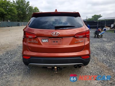 Zdjęcie 6 z 12 samochodu: 2014 HYUNDAI SANTA FE SPORT 2.0T VIN:5XYZW3LAXEG213552 - miniatura