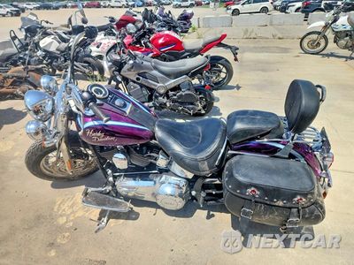 Trzecie zdjęcie samochodu z tyłu: 2013 HARLEY-DAVIDSON FLSTN SOFTAIL DELUXE VIN:1HD1JDV14DB013093 - miniatura