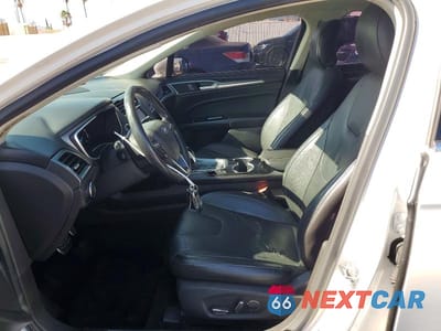 Zdjęcie 7 z 12 samochodu: 2016 FORD FUSION TITANIUM PHEV VIN:3FA6P0SU5GR157013 - miniatura