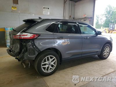 Trzecie zdjęcie samochodu z tyłu: 2022 FORD EDGE SEL VIN:2FMPK4J92NBA53717 - miniatura