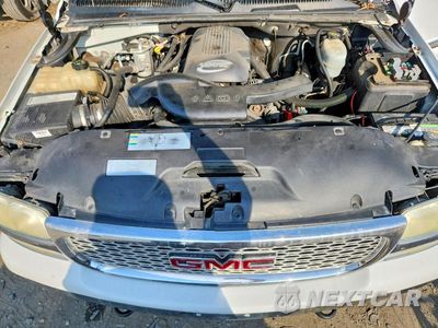 Zdjęcie 12 z 13 samochodu: 2004 GMC YUKON VIN:1GKEK13ZX4J306398 - miniatura