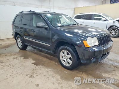 Czwarte zdjęcie samochodu z boku: 2010 JEEP GRAND CHEROKEE LAREDO VIN:1J4PR4GK9AC120733 - miniatura