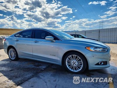 Czwarte zdjęcie samochodu z boku: 2013 FORD FUSION SE HYBRID VIN:3FA6P0LU4DR260787 - miniatura