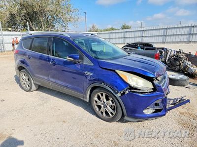 Czwarte zdjęcie samochodu z boku: 2015 FORD ESCAPE TITANIUM VIN:1FMCU9J9XFUA19669 - miniatura