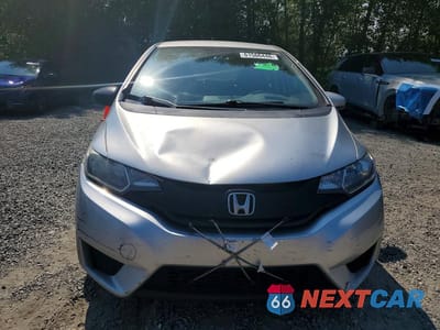 Piąte zdjęcie samochodu w środku: 2016 HONDA FIT LX VIN:JHMGK5H56GX027547 - miniatura