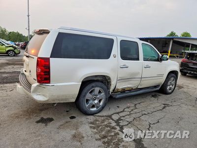Trzecie zdjęcie samochodu z tyłu: 2010 CHEVROLET SUBURBAN K1500 LTZ VIN:1GNUKKE31AR273981 - miniatura