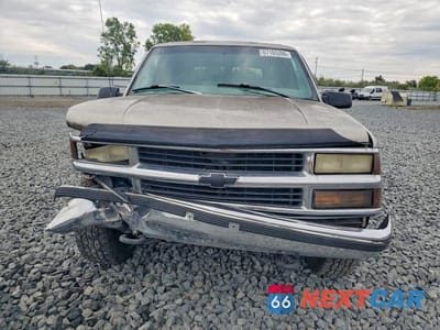 Piąte zdjęcie samochodu w środku: 1999 CHEVROLET TAHOE K1500 VIN:1GNEK13R6XJ412564 - miniatura