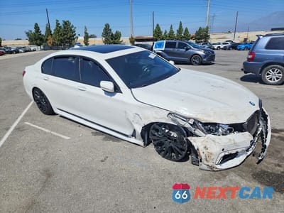 Czwarte zdjęcie samochodu z boku: 2019 BMW 740 I VIN:WBA7E2C55KB217440 - miniatura