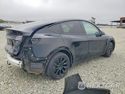 Trzecie zdjęcie samochodu z tyłu: 2022 TESLA MODEL Y VIN:7SAYGAEE7NF490036 - miniatura