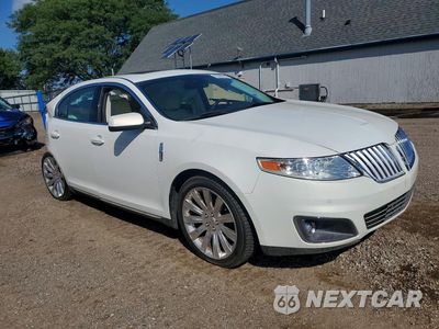 Czwarte zdjęcie samochodu z boku: 2012 LINCOLN MKS VIN:1LNHL9DR5CG801893 - miniatura