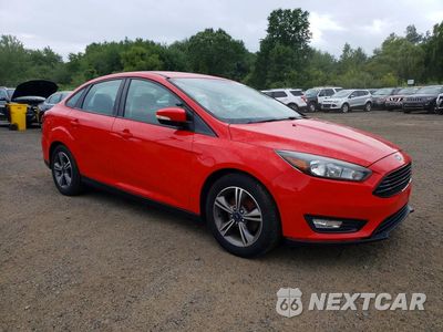 Czwarte zdjęcie samochodu z boku: 2017 FORD FOCUS SE VIN:1FADP3FE9HL322881 - miniatura