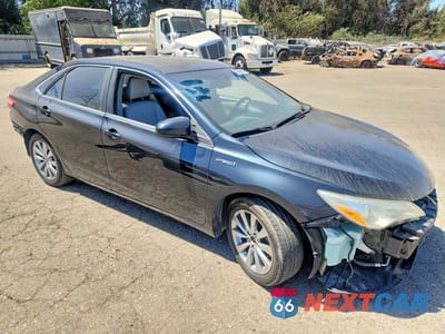 Czwarte zdjęcie samochodu z boku: 2015 TOYOTA CAMRY HYBRID XLE VIN:4T1BD1FK4FU167051 - miniatura
