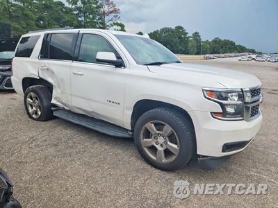 Czwarte zdjęcie samochodu z boku: 2019 CHEVROLET TAHOE C1500 LT VIN:1GNSCBKC6KR262226 - miniatura