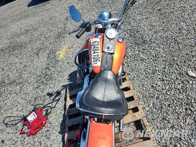 Zdjęcie 6 z 8 samochodu: 2012 HARLEY-DAVIDSON FLSTN SOFTAIL DELUXE VIN:1HD1JDV18CB043325 - miniatura