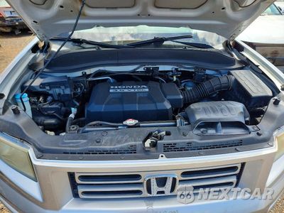 Zdjęcie 11 z 12 samochodu: 2007 HONDA RIDGELINE RT VIN:2HJYK16227H531844 - miniatura