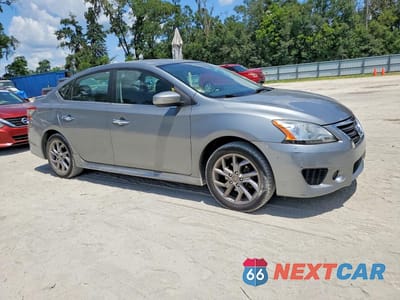 Czwarte zdjęcie samochodu z boku: 2014 NISSAN SENTRA SR VIN:3N1AB7AP4EY288382 - miniatura