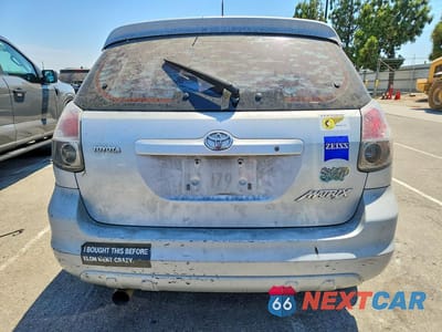 Zdjęcie 6 z 12 samochodu: 2006 TOYOTA MATRIX BASE VIN:2T1KR32E76C589815 - miniatura