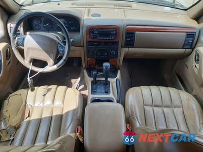 Zdjęcie 8 z 13 samochodu: 1999 JEEP GRAND CHEROKEE LIMITED VIN:1J4GW68NXXC696921 - miniatura