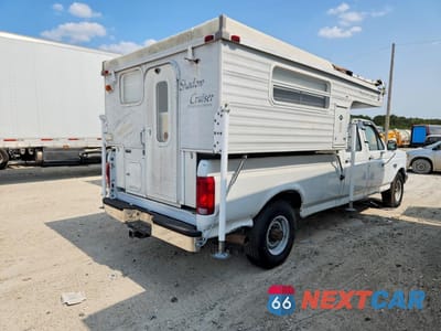 Trzecie zdjęcie samochodu z tyłu: 1995 FORD F350 VIN:1FTJW35F4SEA28357 - miniatura
