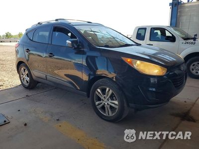 Czwarte zdjęcie samochodu z boku: 2012 HYUNDAI TUCSON GLS VIN:KM8JU3AC6CU324484 - miniatura