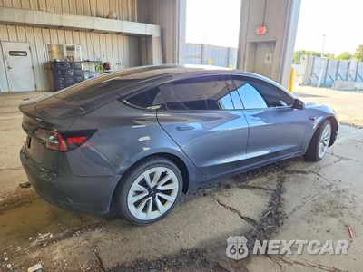 Trzecie zdjęcie samochodu z tyłu: 2023 TESLA MODEL 3 VIN:5YJ3E1EA1PF467705 - miniatura