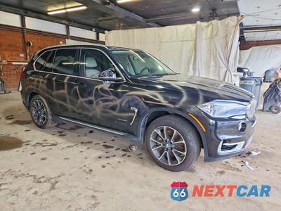 Czwarte zdjęcie samochodu z boku: 2015 BMW X5 XDRIVE50I VIN:5UXKR6C5XF0J78448 - miniatura