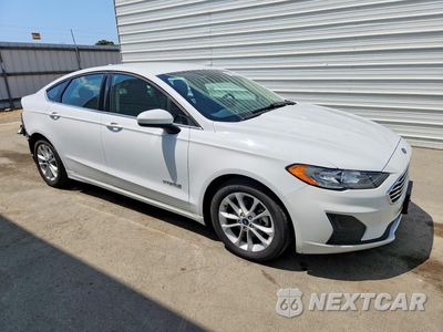 Czwarte zdjęcie samochodu z boku: 2019 FORD FUSION SE VIN:3FA6P0LU5KR263968 - miniatura