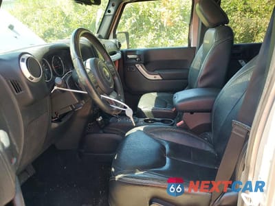 Zdjęcie 7 z 13 samochodu: 2013 JEEP WRANGLER UNLIMITED SAHARA VIN:1C4BJWEGXDL548221 - miniatura