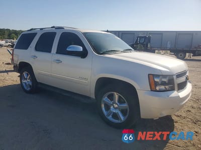 Czwarte zdjęcie samochodu z boku: 2012 CHEVROLET TAHOE C1500 LTZ VIN:1GNSCCE09CR122762 - miniatura