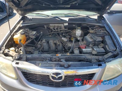 Zdjęcie 12 z 13 samochodu: 2008 MAZDA TRIBUTE S VIN:4F2CZ06118KM00149 - miniatura