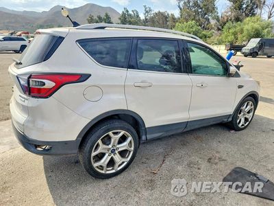 Trzecie zdjęcie samochodu z tyłu: 2018 FORD ESCAPE TITANIUM VIN:1FMCU0J90JUA04666 - miniatura