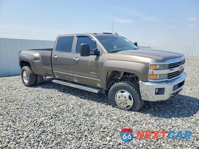 Czwarte zdjęcie samochodu z boku: 2015 CHEVROLET SILVERADO K3500 LTZ VIN:1GC4K0E89FF157736 - miniatura