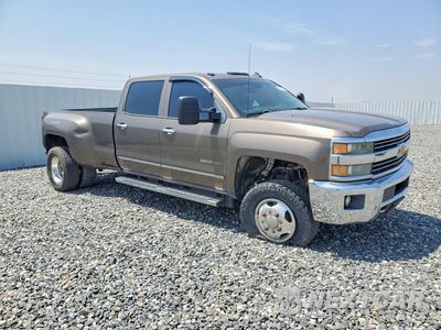 Czwarte zdjęcie samochodu z boku: 2015 CHEVROLET SILVERADO K3500 LTZ VIN:1GC4K0E89FF157736 - miniatura