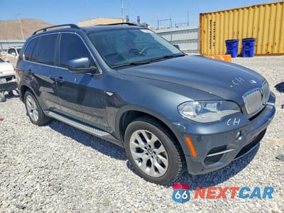 Czwarte zdjęcie samochodu z boku: 2013 BMW X5 XDRIVE35I VIN:5UXZV4C57D0B22403 - miniatura
