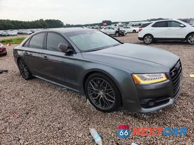 Czwarte zdjęcie samochodu z boku: 2017 AUDI S8 PLUS QUATTRO VIN:WUAJ5AFD8HN900944 - miniatura