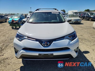 Piąte zdjęcie samochodu w środku: 2018 TOYOTA RAV4 HYBRID XLE VIN:JTMRJREVXJD158188 - miniatura