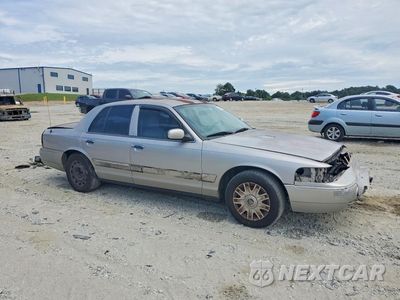 Czwarte zdjęcie samochodu z boku: 2005 MERCURY GRAND MARQUIS GS VIN:2MEFM74W55X620582 - miniatura