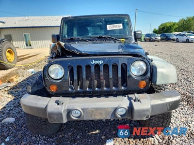 Piąte zdjęcie samochodu w środku: 2011 JEEP WRANGLER UNLIMITED RUBICON VIN:1J4BA6H17BL593471 - miniatura