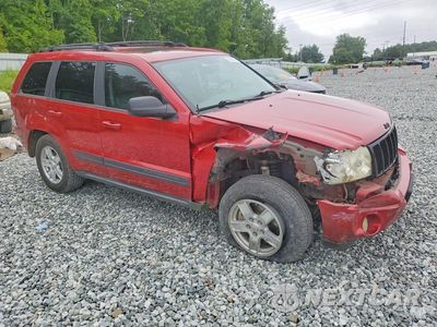 Czwarte zdjęcie samochodu z boku: 2006 JEEP GRAND CHEROKEE LAREDO VIN:1J4HR48NX6C222191 - miniatura