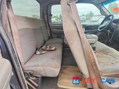 Zdjęcie 10 z 12 samochodu: 2000 FORD F150 VIN:1FTRX18L2YNA44491 - miniatura