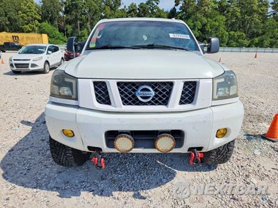 Piąte zdjęcie samochodu w środku: 2011 NISSAN TITAN SV VIN:1N6BA0EC3BN316889 - miniatura