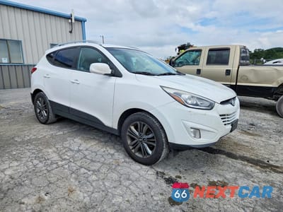 Czwarte zdjęcie samochodu z boku: 2015 HYUNDAI TUCSON SE VIN:KM8JUCAG5FU109475 - miniatura