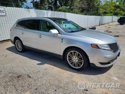 Czwarte zdjęcie samochodu z boku: 2015 LINCOLN MKT VIN:2LMHJ5AT7FBL03807 - miniatura