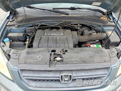 Zdjęcie 12 z 13 samochodu: 2005 HONDA PILOT EXL VIN:5FNYF18625B041710 - miniatura