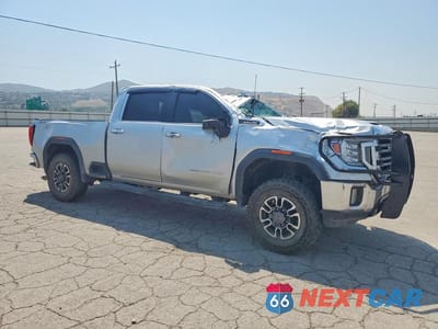 Czwarte zdjęcie samochodu z boku: 2020 GMC SIERRA K2500 SLT VIN:1GT49NE72LF339399 - miniatura