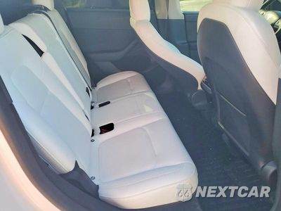 Zdjęcie 10 z 12 samochodu: 2023 TESLA MODEL Y VIN:7SAYGDEF3PF688237 - miniatura