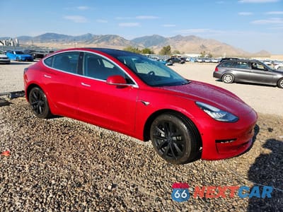 Czwarte zdjęcie samochodu z boku: 2020 TESLA MODEL 3 VIN:5YJ3E1EB8LF710994 - miniatura
