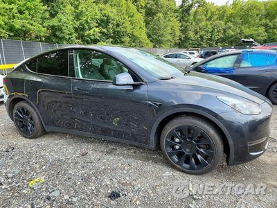 Czwarte zdjęcie samochodu z boku: 2024 TESLA MODEL Y VIN:7SAYGDED9RF055498 - miniatura